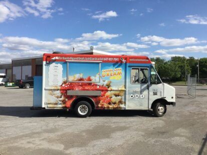 Modern ice cream truck serving snowballs, funnel cakes, deep-fried Oreos  and burgers in DeSoto